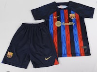a barcelona soccer jersey and shorts set